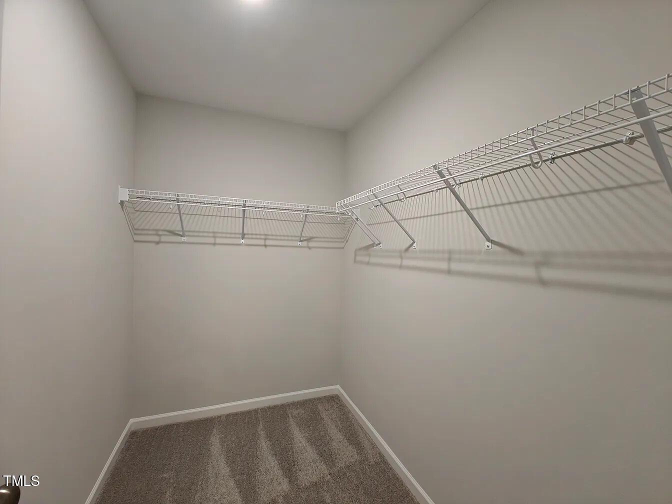 2409 Englemann Drive Apex, NC 27502 - Photo 15 of 25 a view of a room with racks on the wall