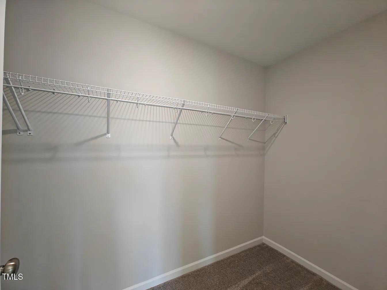 2409 Englemann Drive Apex, NC 27502 - Photo 17 of 25 a view of a room with racks on the wall