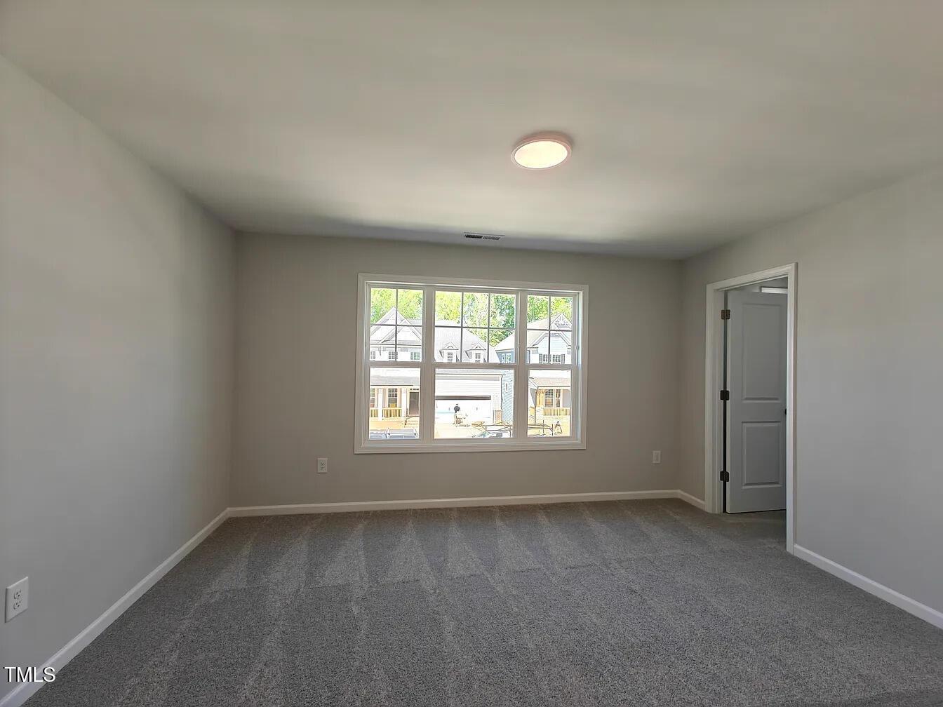 2409 Englemann Drive Apex, NC 27502 - Photo 22 of 25 an empty room with a window