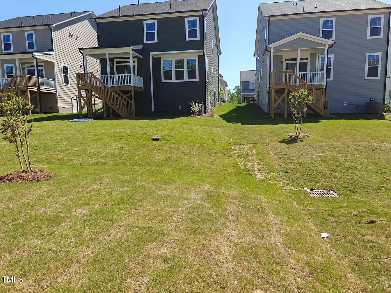 2409 Englemann Drive Apex, NC 27502 - Photo 24 of 25 a view of a brick house with a yard