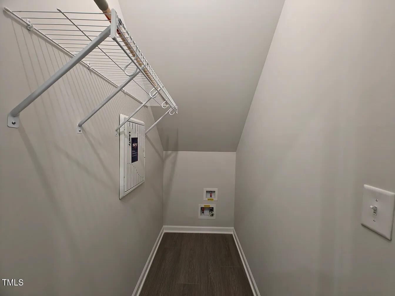 2409 Englemann Drive Apex, NC 27502 - Photo 7 of 25 a view of a hallway with staircase