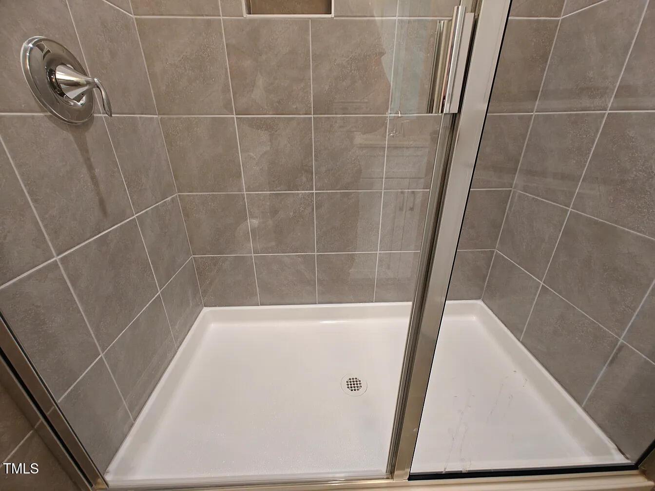 2409 Englemann Drive Apex, NC 27502 - Photo 10 of 25 a bathroom with a sink