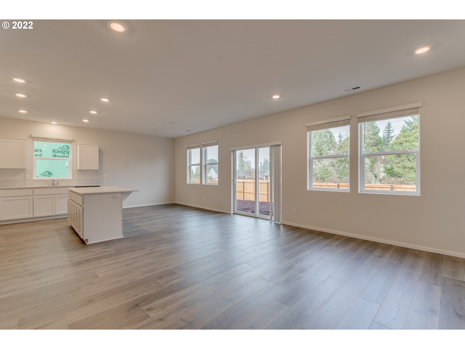 2917 W Street Springfield, OR 97477 - Photo 23 of 26 a view of an empty room with wooden floor and a window