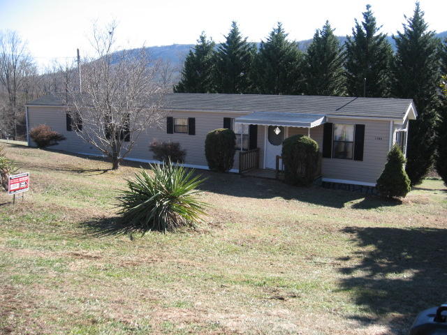 1794 Villamont Road Blue Ridge, VA 24064 - Photo 1 of 1 a view of a house with a yard