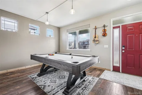 a living room with furniture and a table