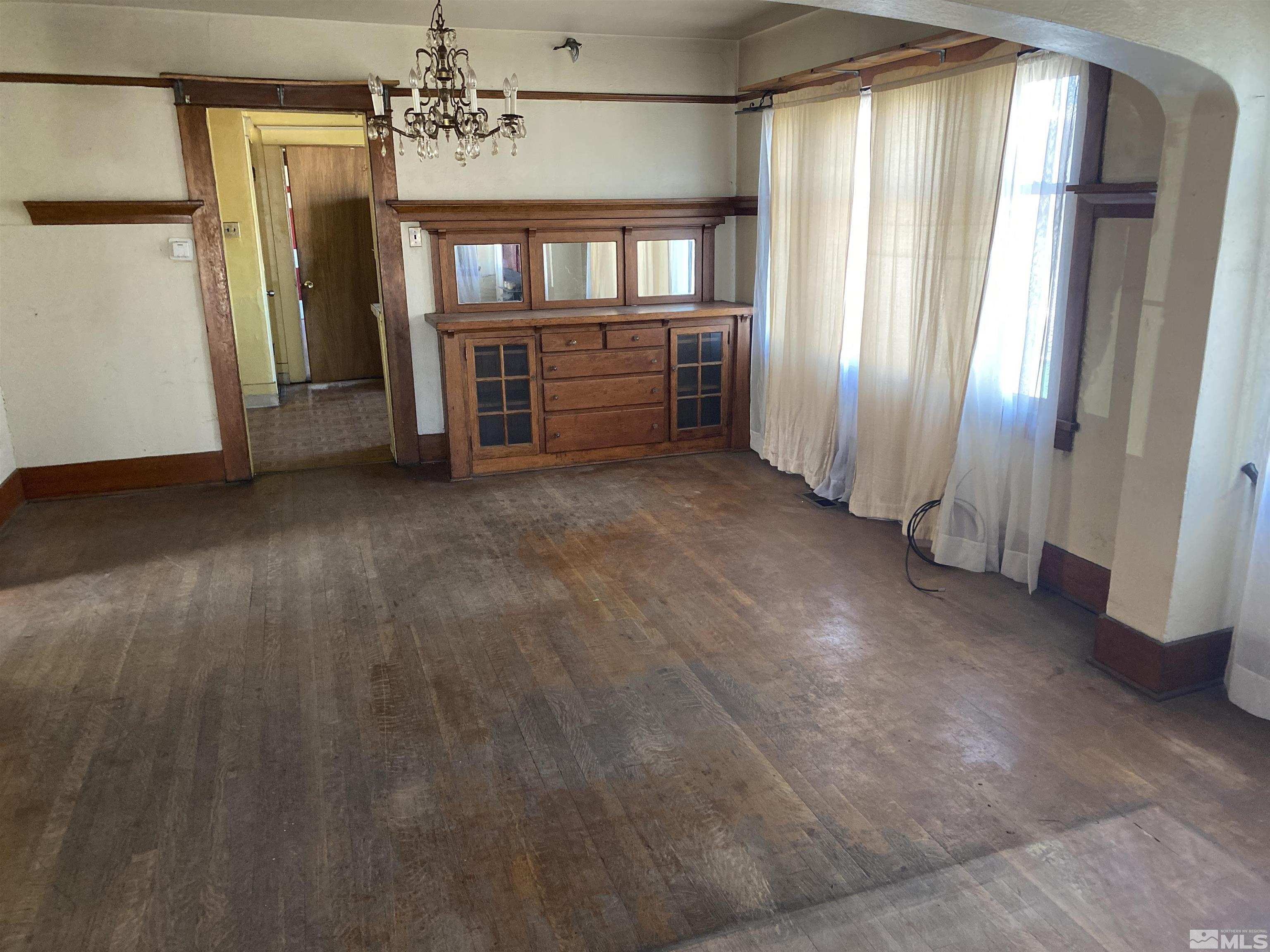 667 Quincy Street Reno, NV 89512 - Photo 4 of 12 a view of a hallway with an empty room