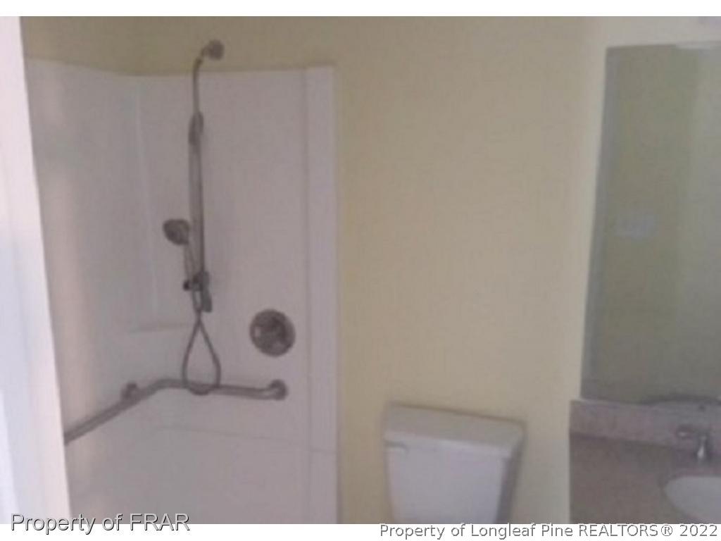 3124 Brechin Road Fayetteville, NC 28303 - Photo 12 of 18 a bathroom with a shower