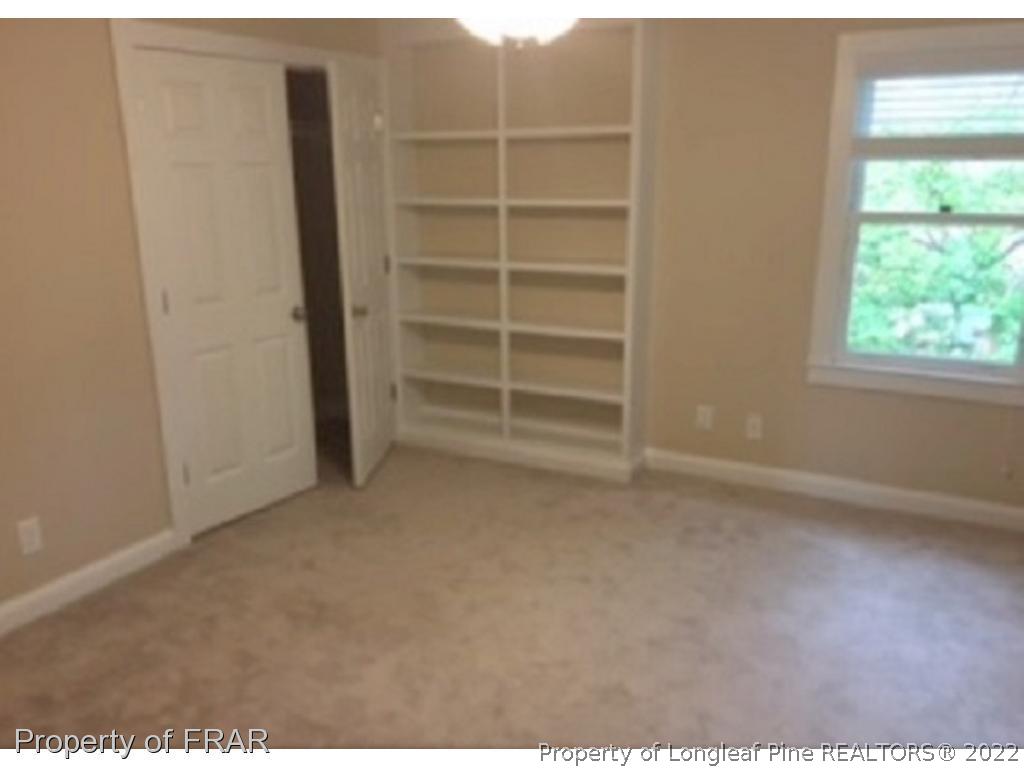 3124 Brechin Road Fayetteville, NC 28303 - Photo 13 of 18 a view of an empty room with a window