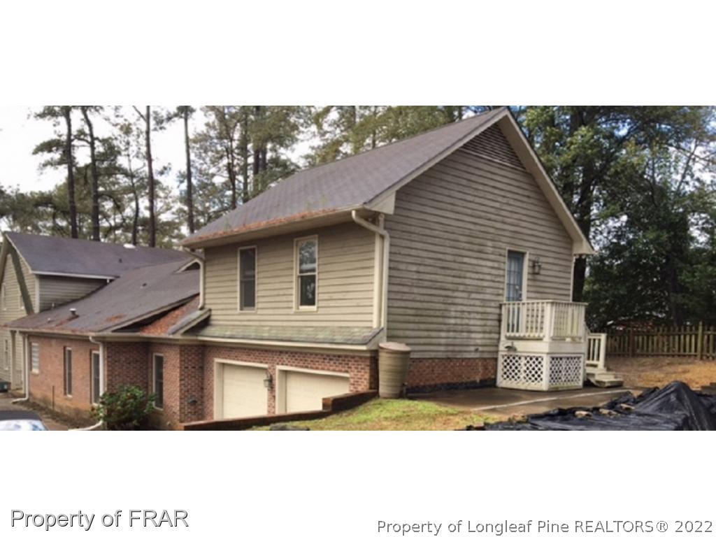 3124 Brechin Road Fayetteville, NC 28303 - Photo 18 of 18 a front view of a house with a yard