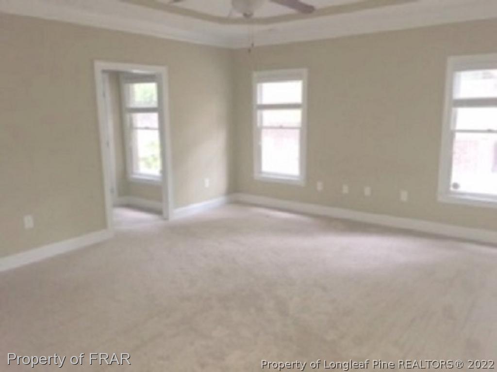 3124 Brechin Road Fayetteville, NC 28303 - Photo 6 of 18 an empty room with windows