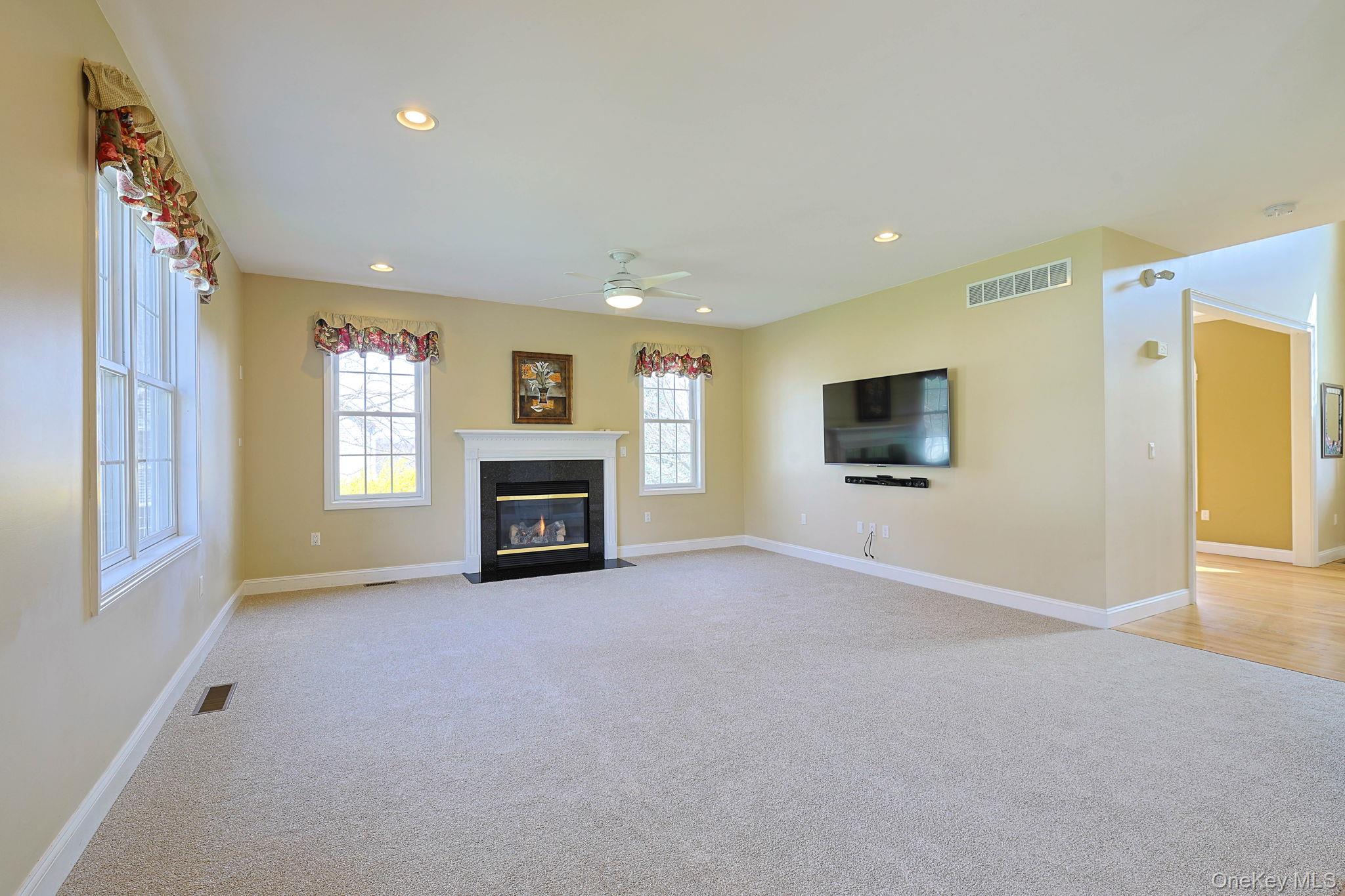 99 Country Club Road Hopewell Junction, NY 12533 - Photo 13 of 44 a view of a livingroom with a fireplace