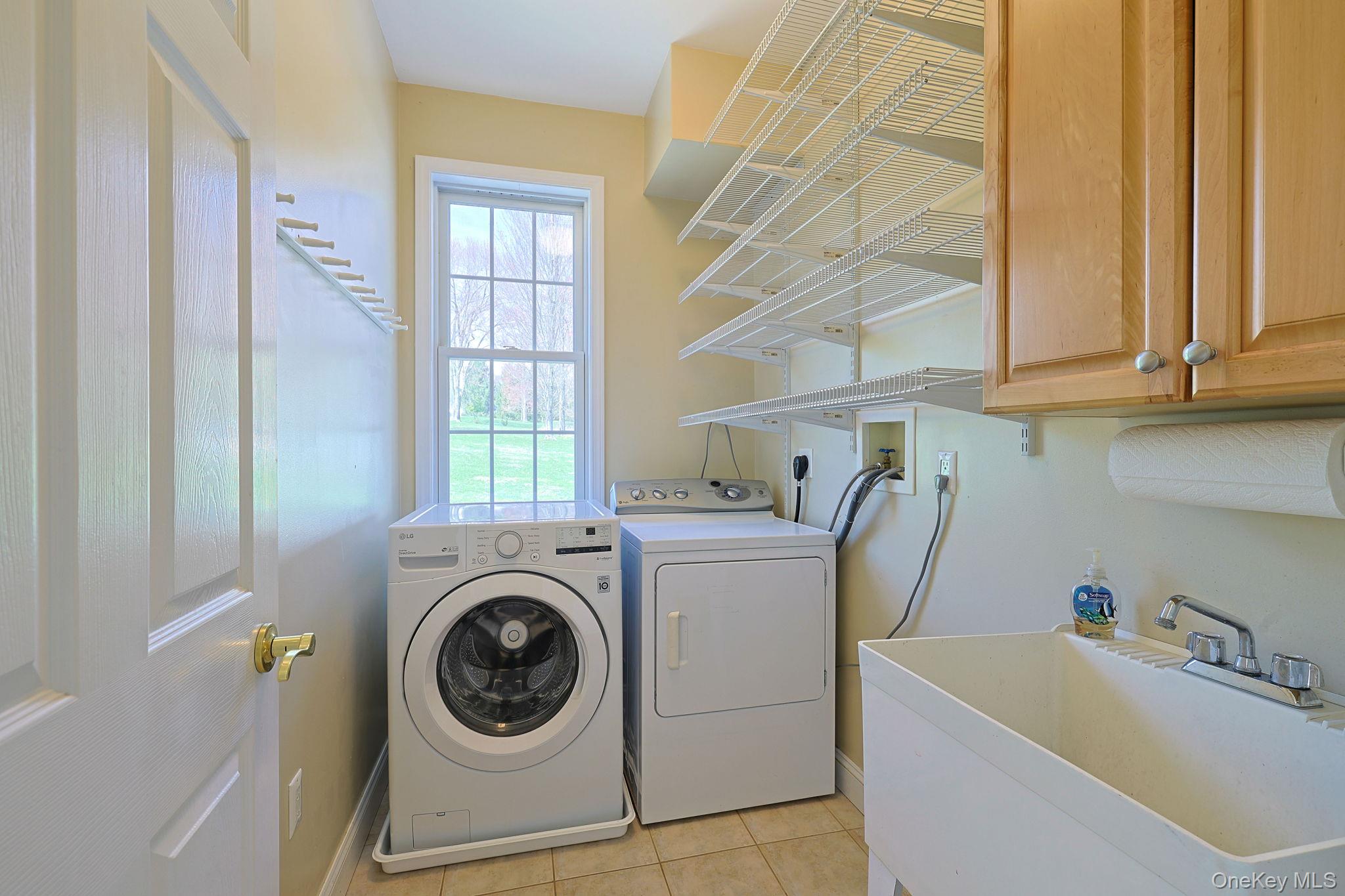 99 Country Club Road Hopewell Junction, NY 12533 - Photo 16 of 44 a utility room with dryer and washer