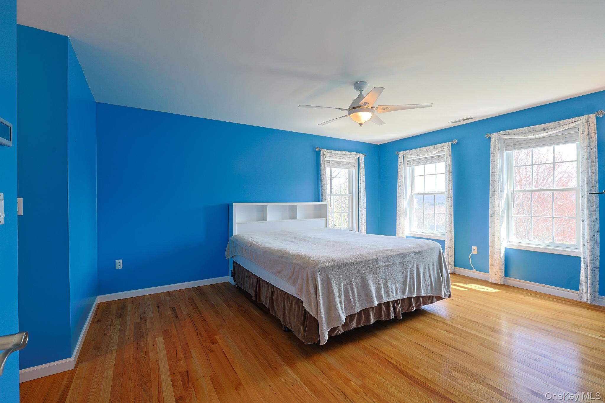 99 Country Club Road Hopewell Junction, NY 12533 - Photo 17 of 44 a spacious bedroom with a bed and a window