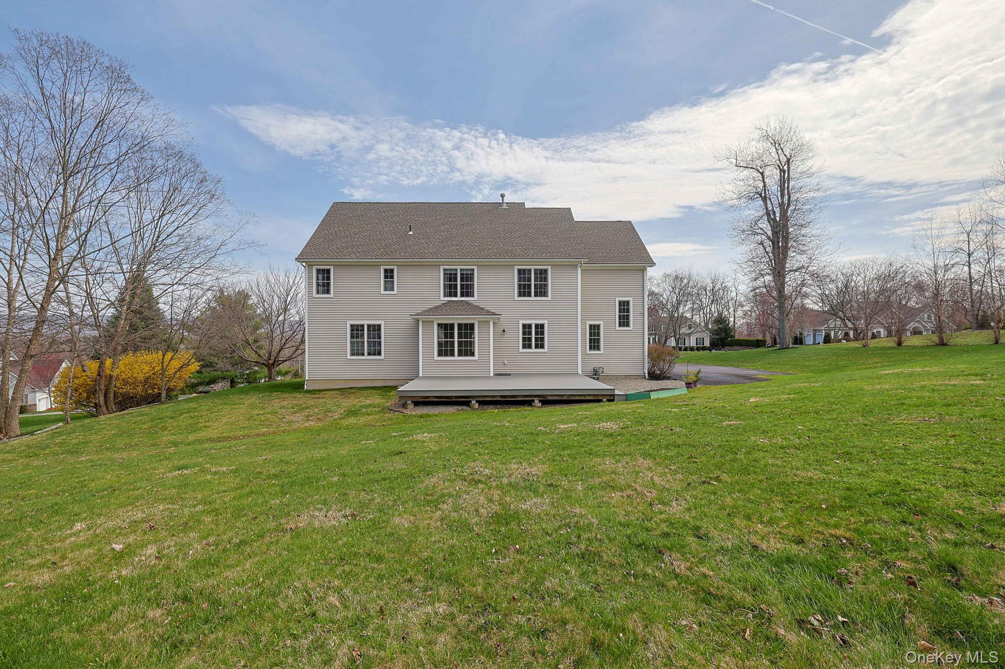 99 Country Club Road Hopewell Junction, NY 12533 - Photo 34 of 44 a view of a yard in front of a house