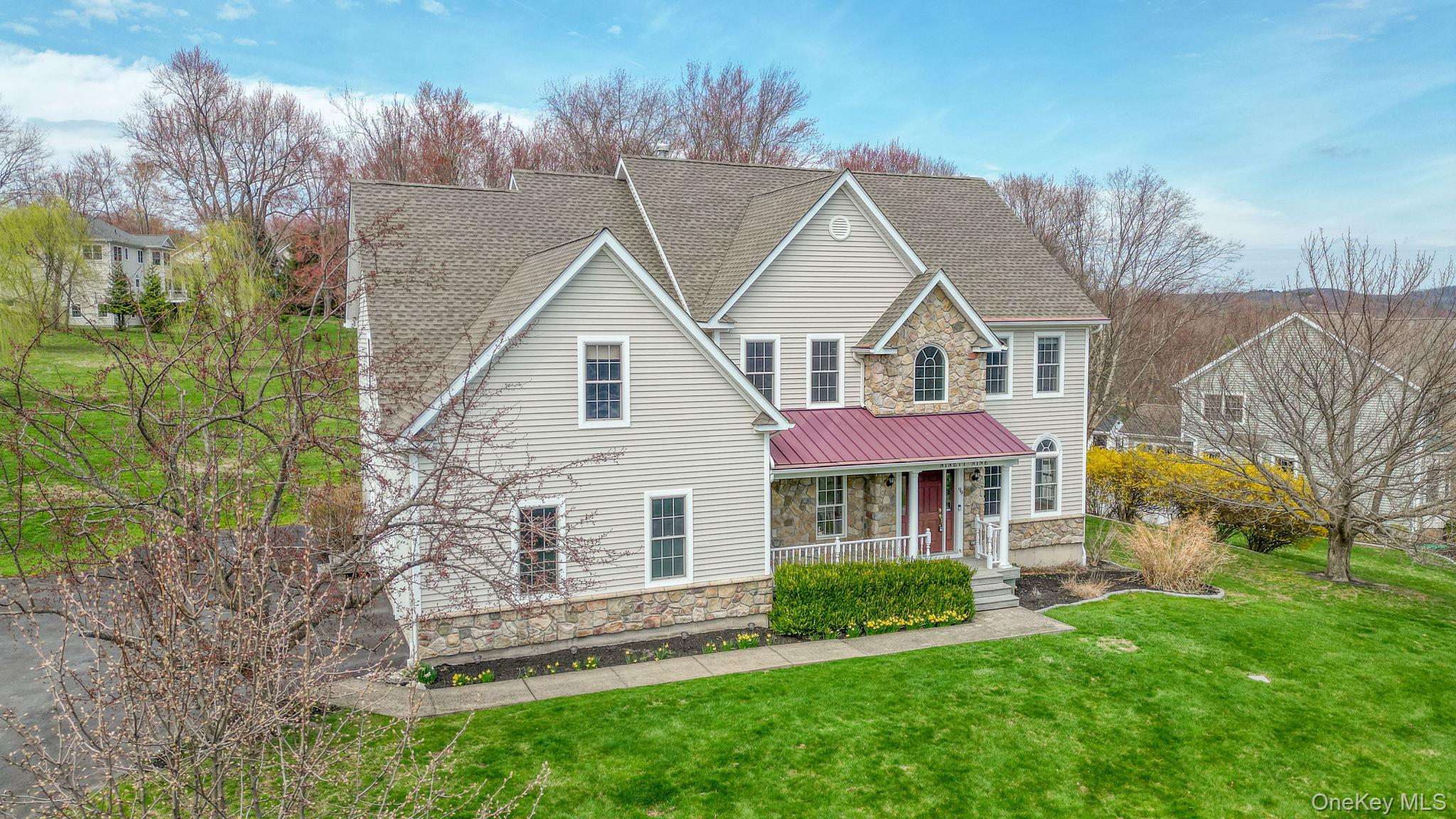 99 Country Club Road Hopewell Junction, NY 12533 - Photo 39 of 44 a front view of a house with a yard