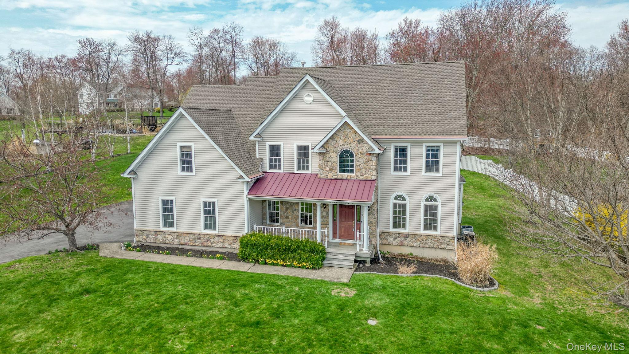 99 Country Club Road Hopewell Junction, NY 12533 - Photo 40 of 44 a view of a house with a yard and sitting area