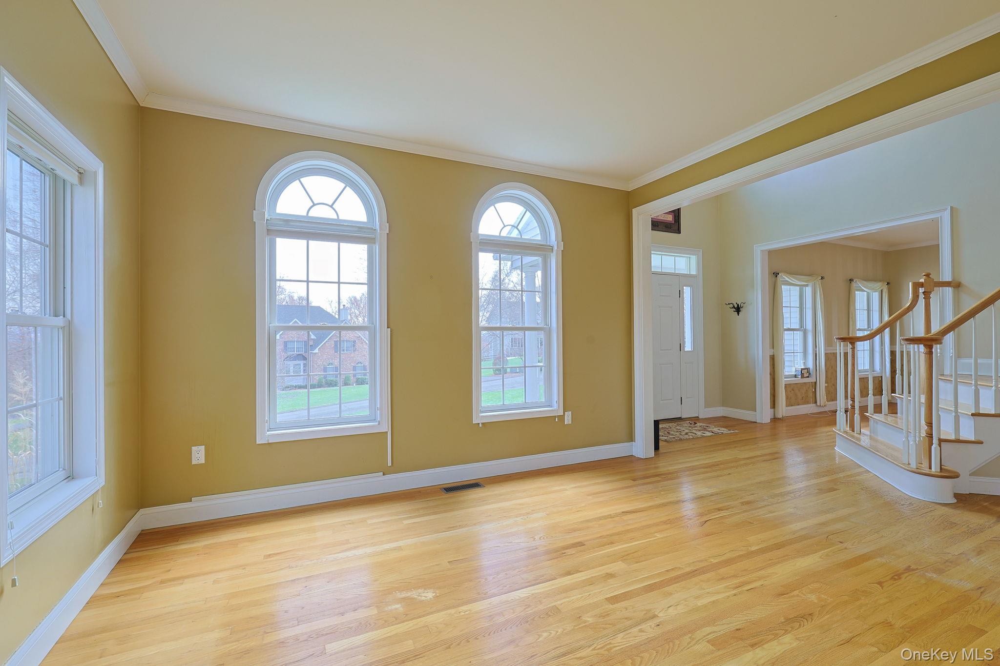 99 Country Club Road Hopewell Junction, NY 12533 - Photo 4 of 44 a view of an empty room with glass door and a window