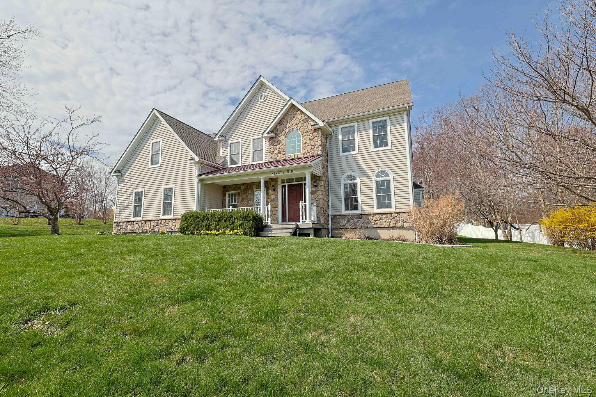 99 Country Club Road Hopewell Junction, NY 12533 - Photo 44 of 44 a front view of a house with a yard