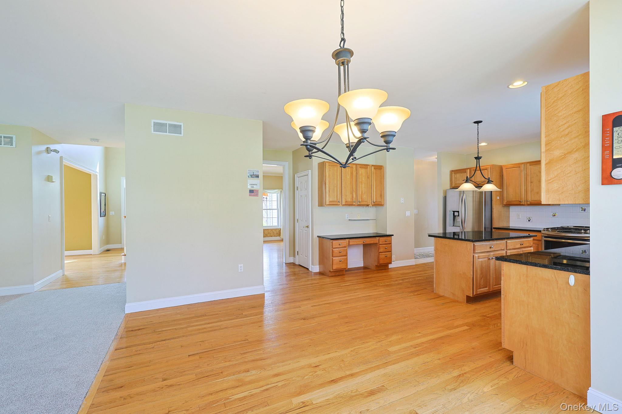 99 Country Club Road Hopewell Junction, NY 12533 - Photo 9 of 44 a view of a kitchen and kitchen island