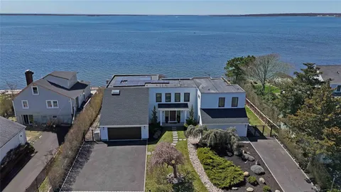 a house with garden in front of it