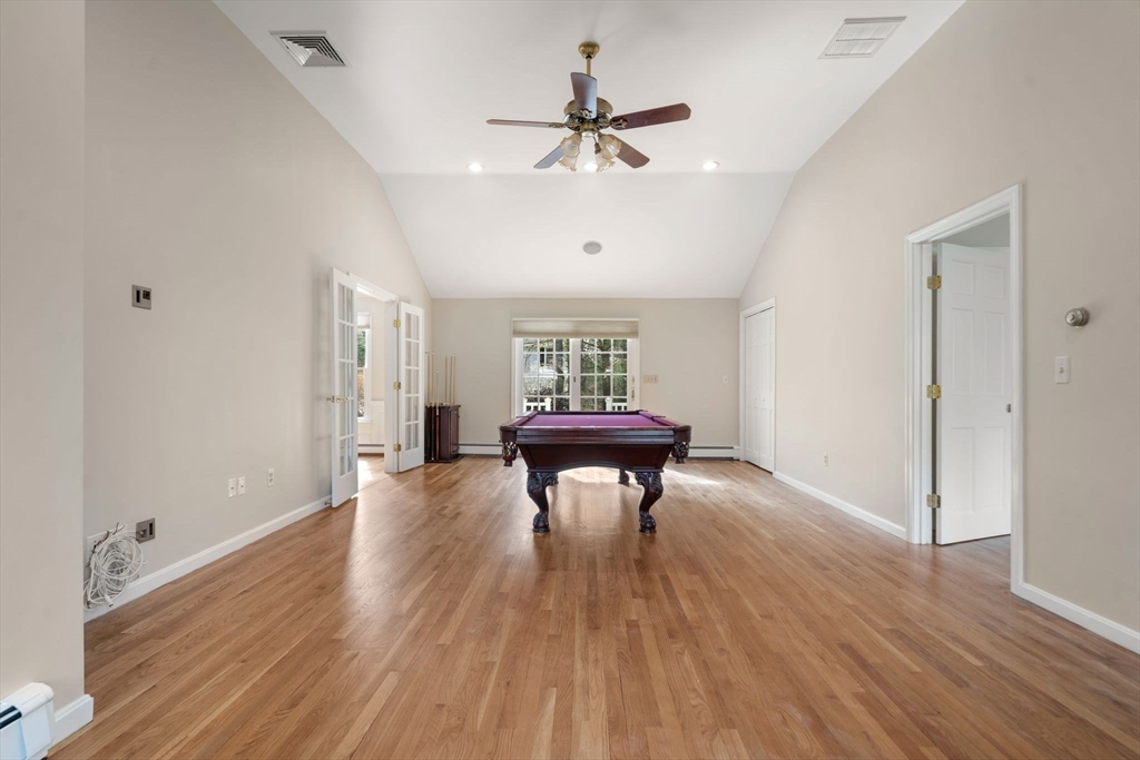 3 Eagle Drive North Reading, MA 01864 - Photo 20 of 42 a living room with furniture and a wooden floor