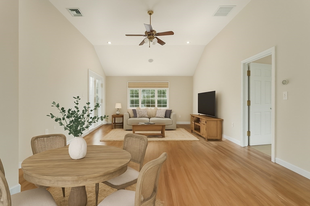 3 Eagle Drive North Reading, MA 01864 - Photo 21 of 42 a view of a livingroom with furniture and a potted plant