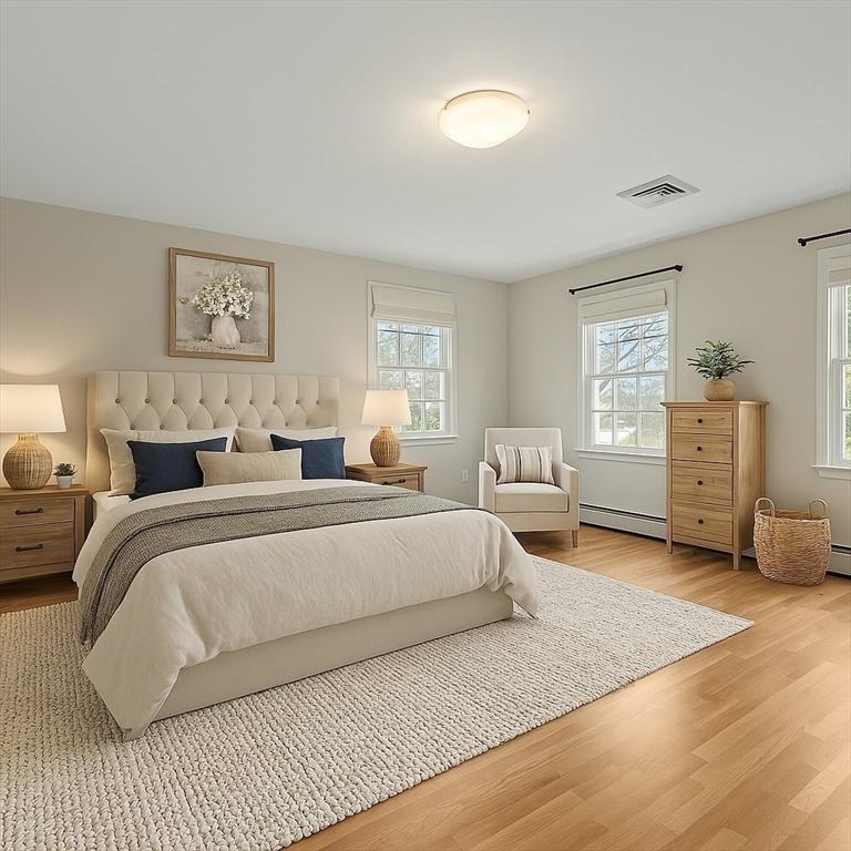 3 Eagle Drive North Reading, MA 01864 - Photo 23 of 42 a spacious bedroom with a bed and dresser