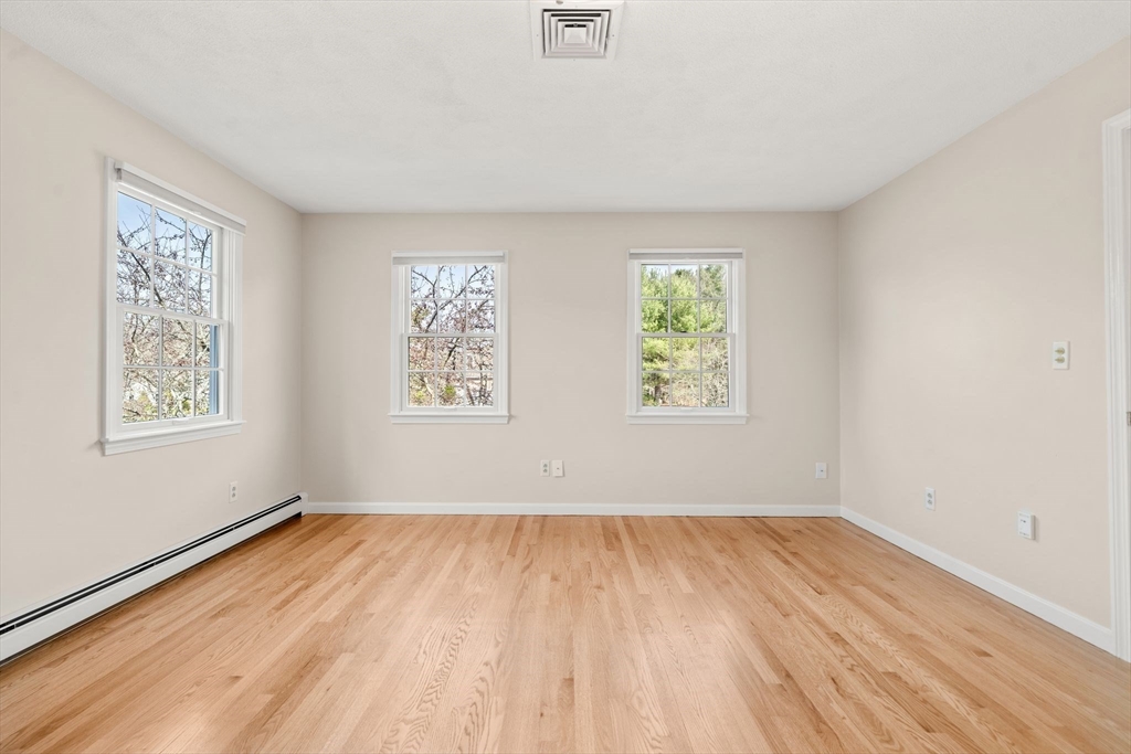 3 Eagle Drive North Reading, MA 01864 - Photo 35 of 42 a view of room with hardwood floor and window