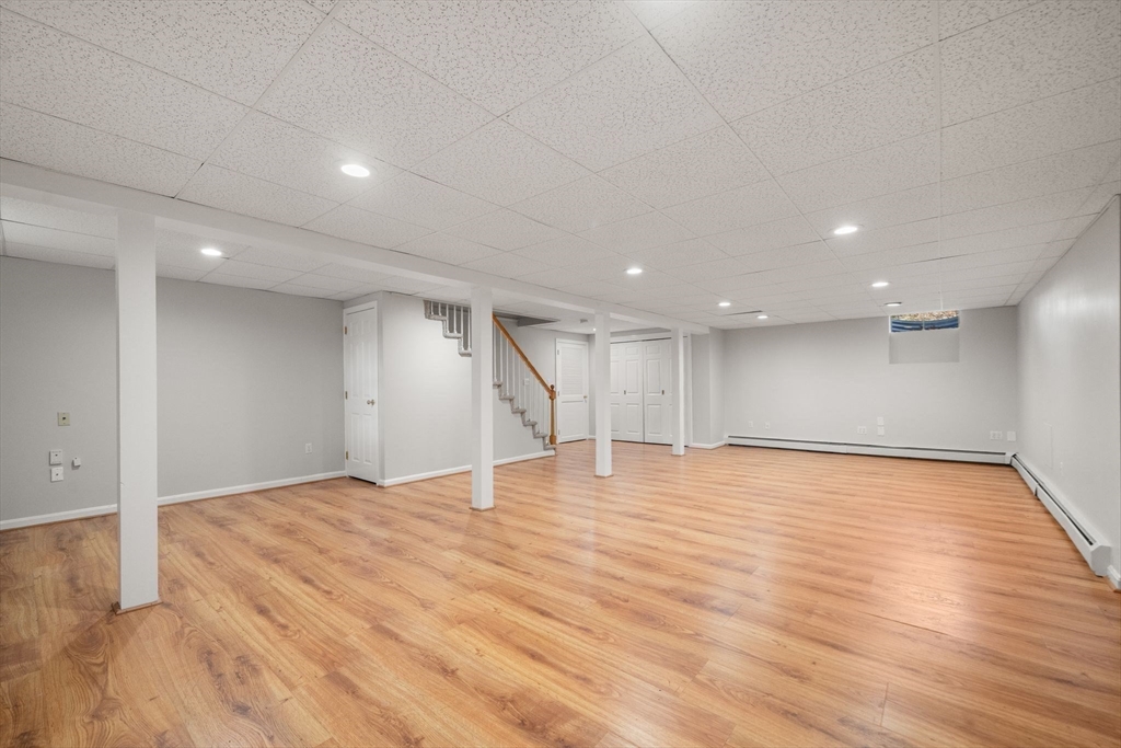 3 Eagle Drive North Reading, MA 01864 - Photo 36 of 42 a view of an empty room with wooden floor