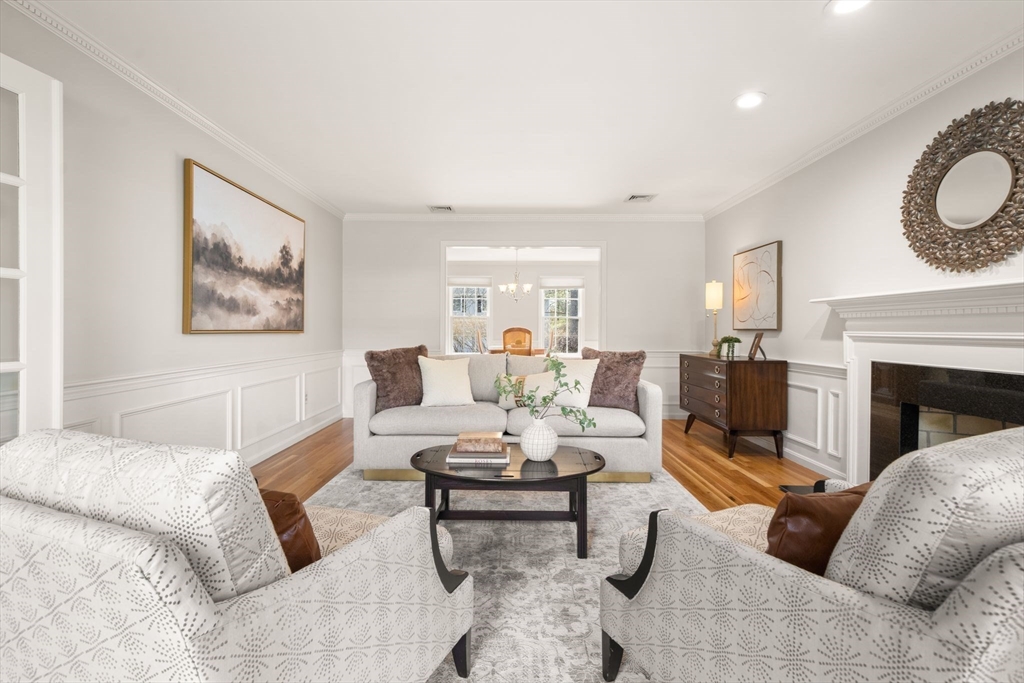3 Eagle Drive North Reading, MA 01864 - Photo 6 of 42 a living room with furniture and a fireplace