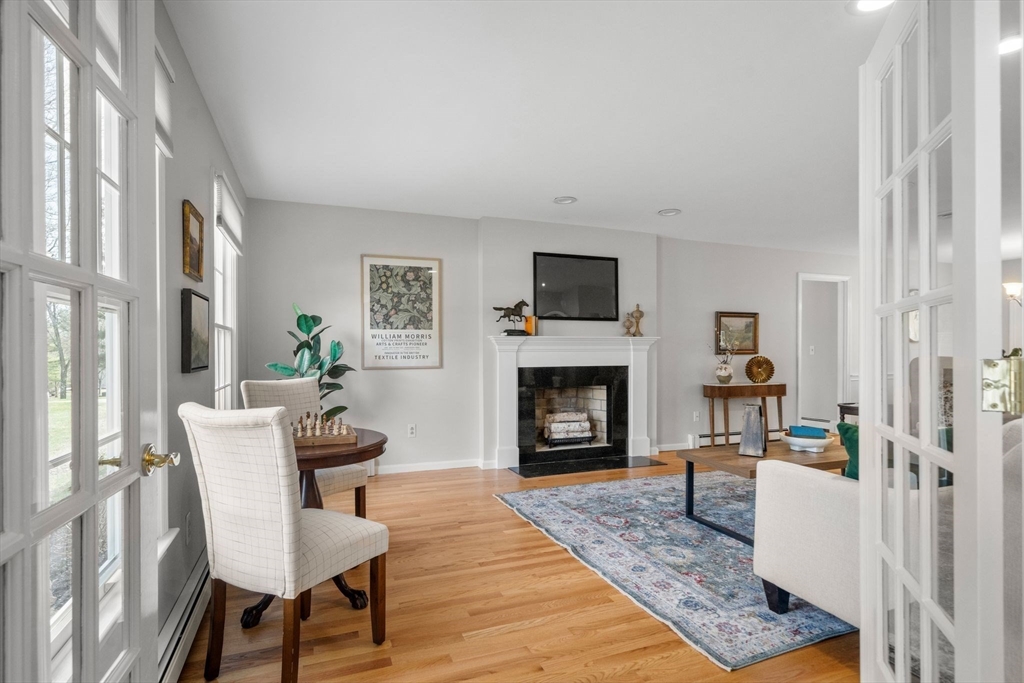 3 Eagle Drive North Reading, MA 01864 - Photo 7 of 42 a living room with furniture and a fireplace