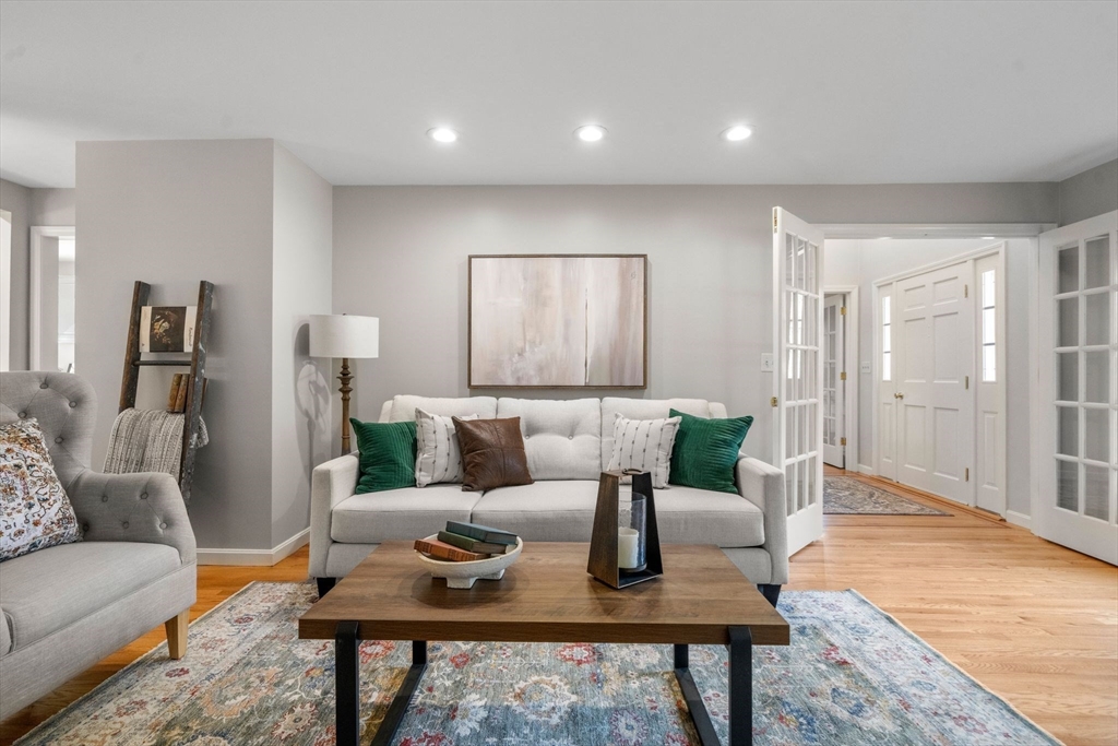 3 Eagle Drive North Reading, MA 01864 - Photo 8 of 42 a living room with furniture and wooden floor