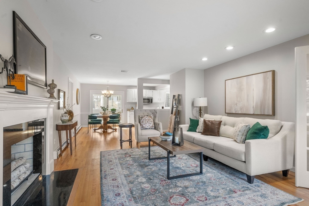 3 Eagle Drive North Reading, MA 01864 - Photo 9 of 42 a living room with furniture and a fireplace