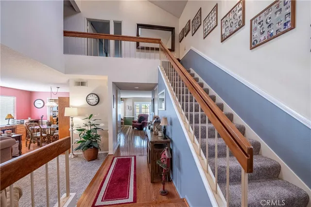 a living room with furniture a lamp and a lamp