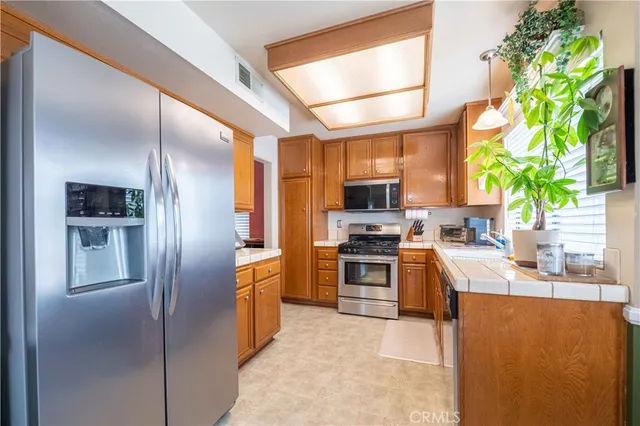 a bedroom with a bed and a desk