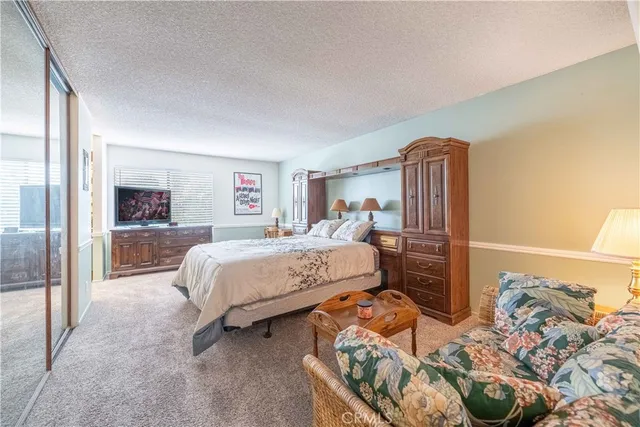 a bathroom with a sink and a large mirror