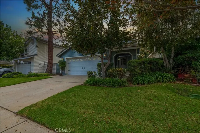 an aerial view of residential houses and outdoor space