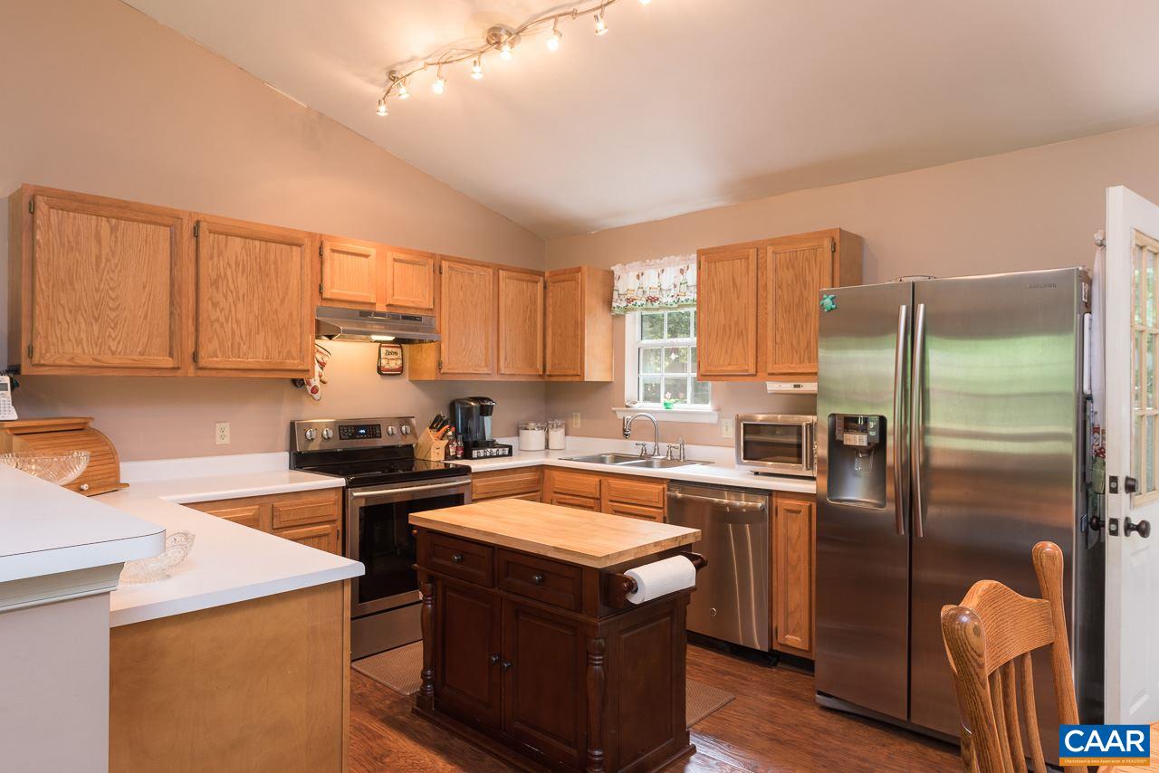 485 Carnation Road Ruckersville, VA 22968 - Photo 4 of 14 a kitchen with a refrigerator stove top oven and sink
