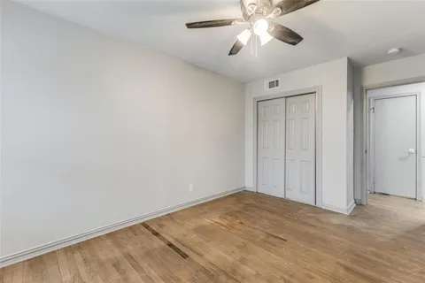 a view of house with a yard