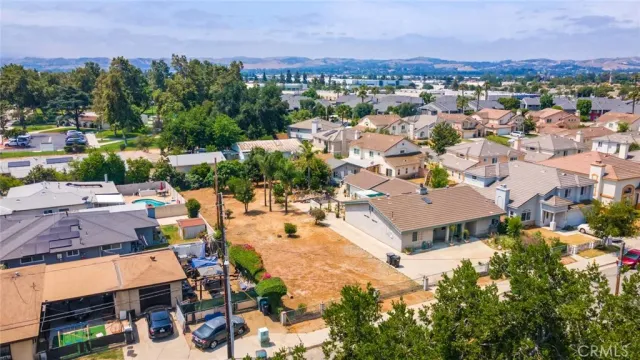 an aerial view of a house with a garden