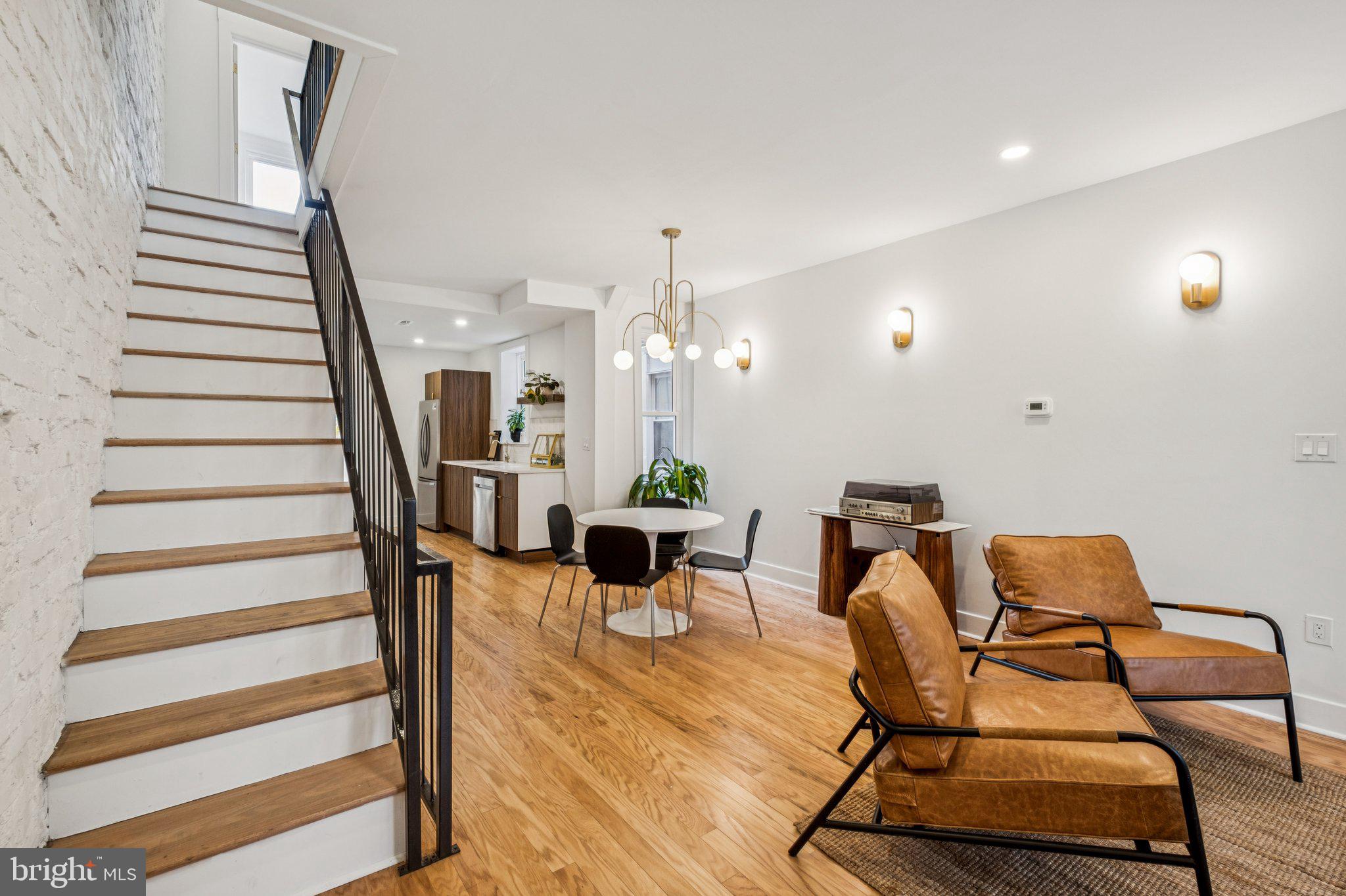 3010 Redner Street Philadelphia, PA 19121 - Photo 11 of 27 a dining room with furniture and wooden floor