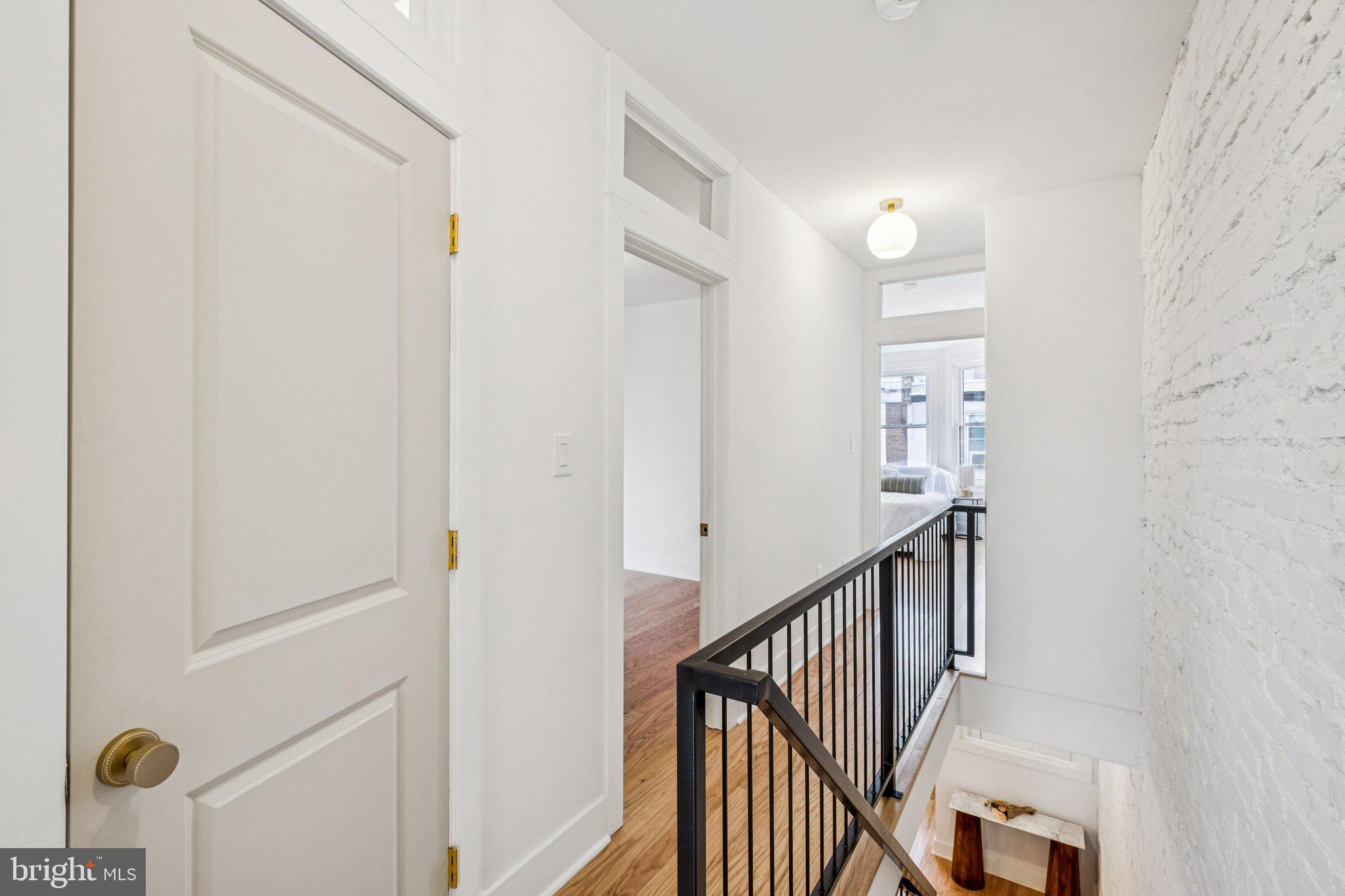 3010 Redner Street Philadelphia, PA 19121 - Photo 12 of 27 a view of a hallway with wooden floor and entryway