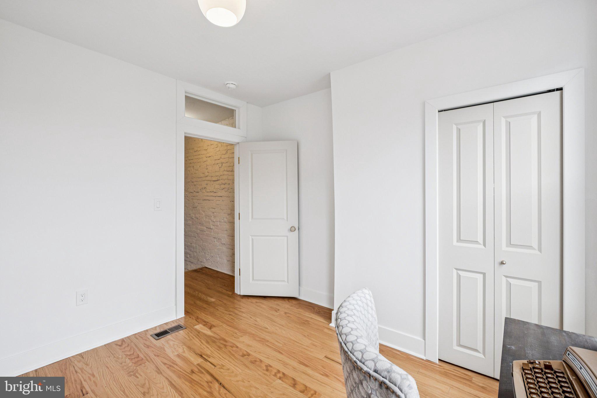 3010 Redner Street Philadelphia, PA 19121 - Photo 19 of 27 a view of a room with wooden floor and closet