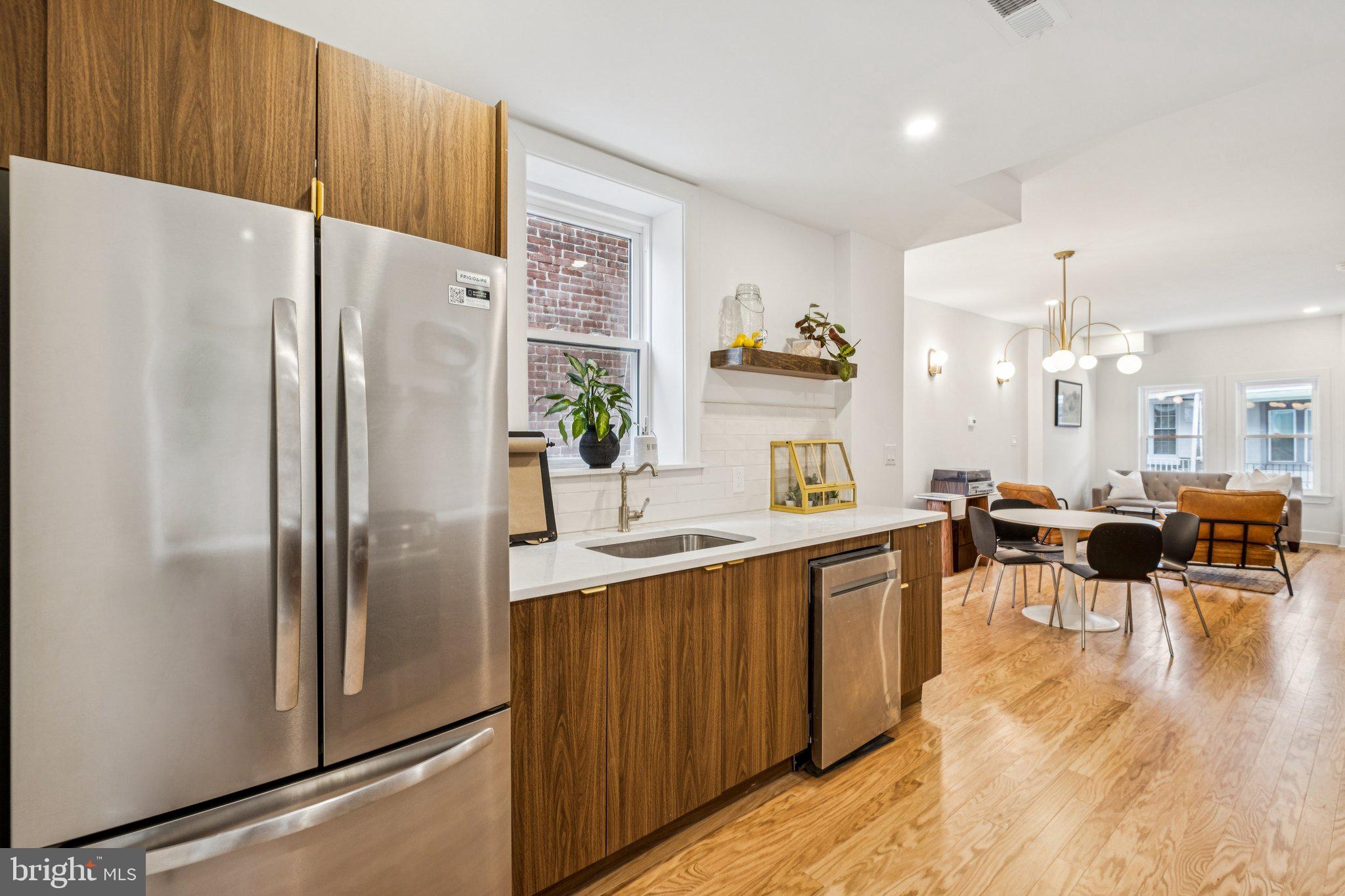 3010 Redner Street Philadelphia, PA 19121 - Photo 7 of 27 a kitchen with counter top space and refrigerator