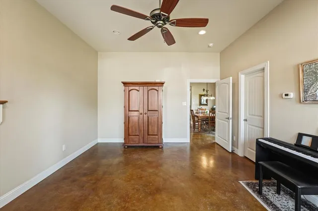 a view of livingroom with hardwood floor and ceiling fan