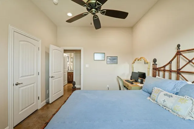 a bedroom with furniture and a window