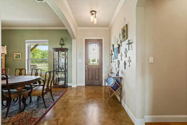 a view of a livingroom with furniture and window