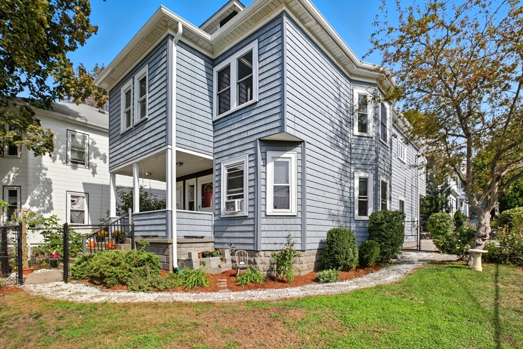 415-417 Washington Street Winchester, MA 01890 - Photo 2 of 41 front view of a house with a yard
