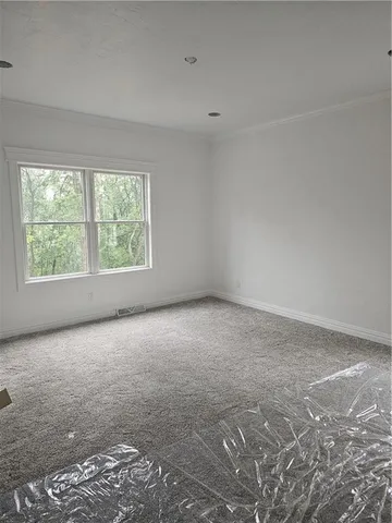 an empty room with windows