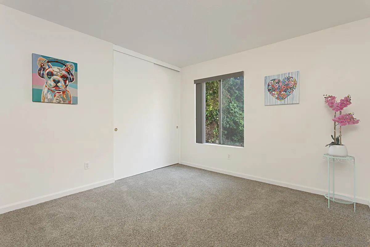 4520 Trieste Drive Carlsbad, CA 92010 - Photo 16 of 27 a view of an empty room with a window
